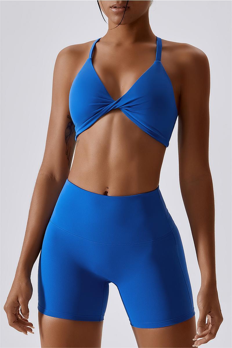 Love & Other Things Tall gym twist back sports bra in blue - part
