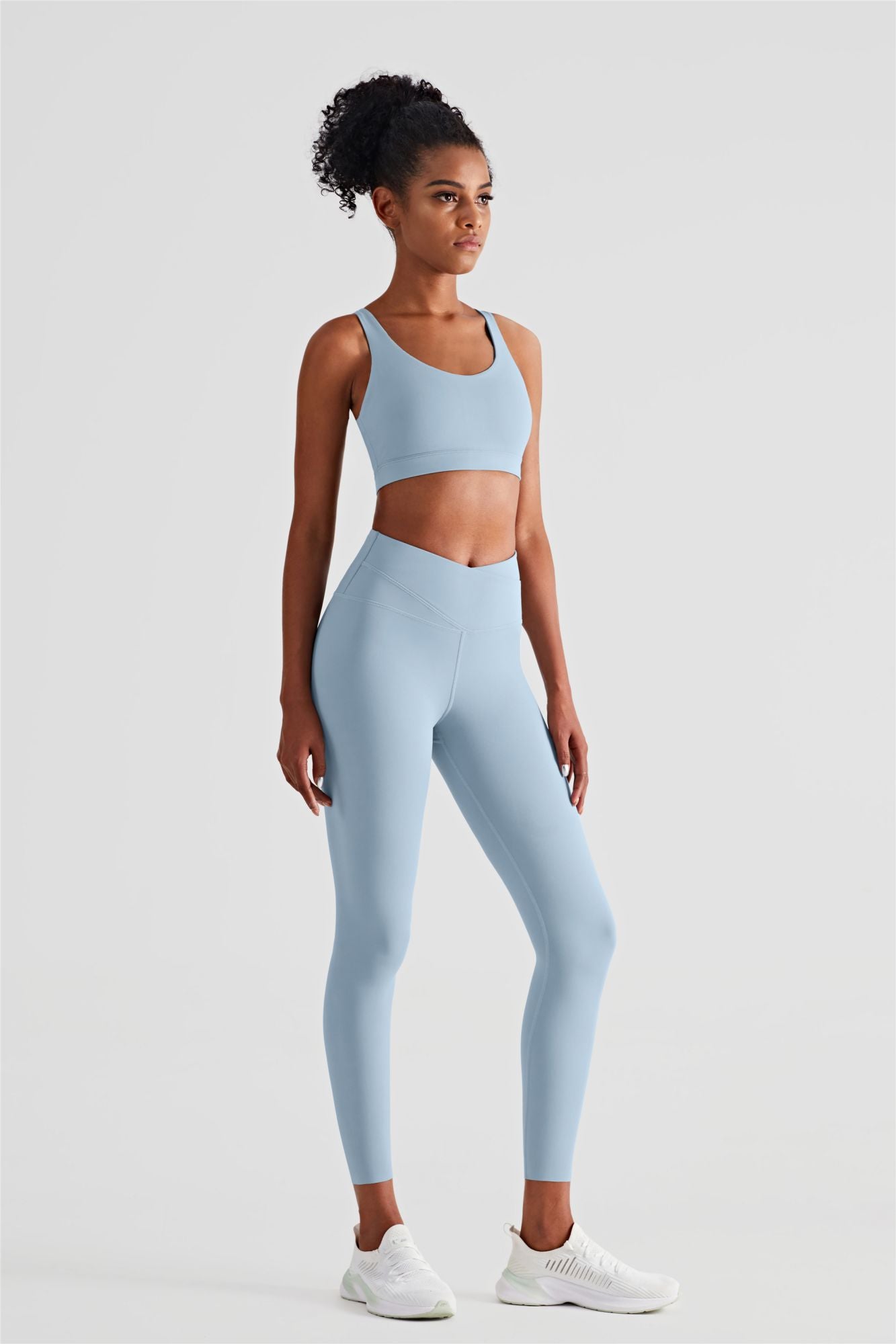https://zioccie.com/cdn/shop/products/racerback-sports-bra-and-crossover-leggings-women-activewear-set_2.jpg?v=1672068837