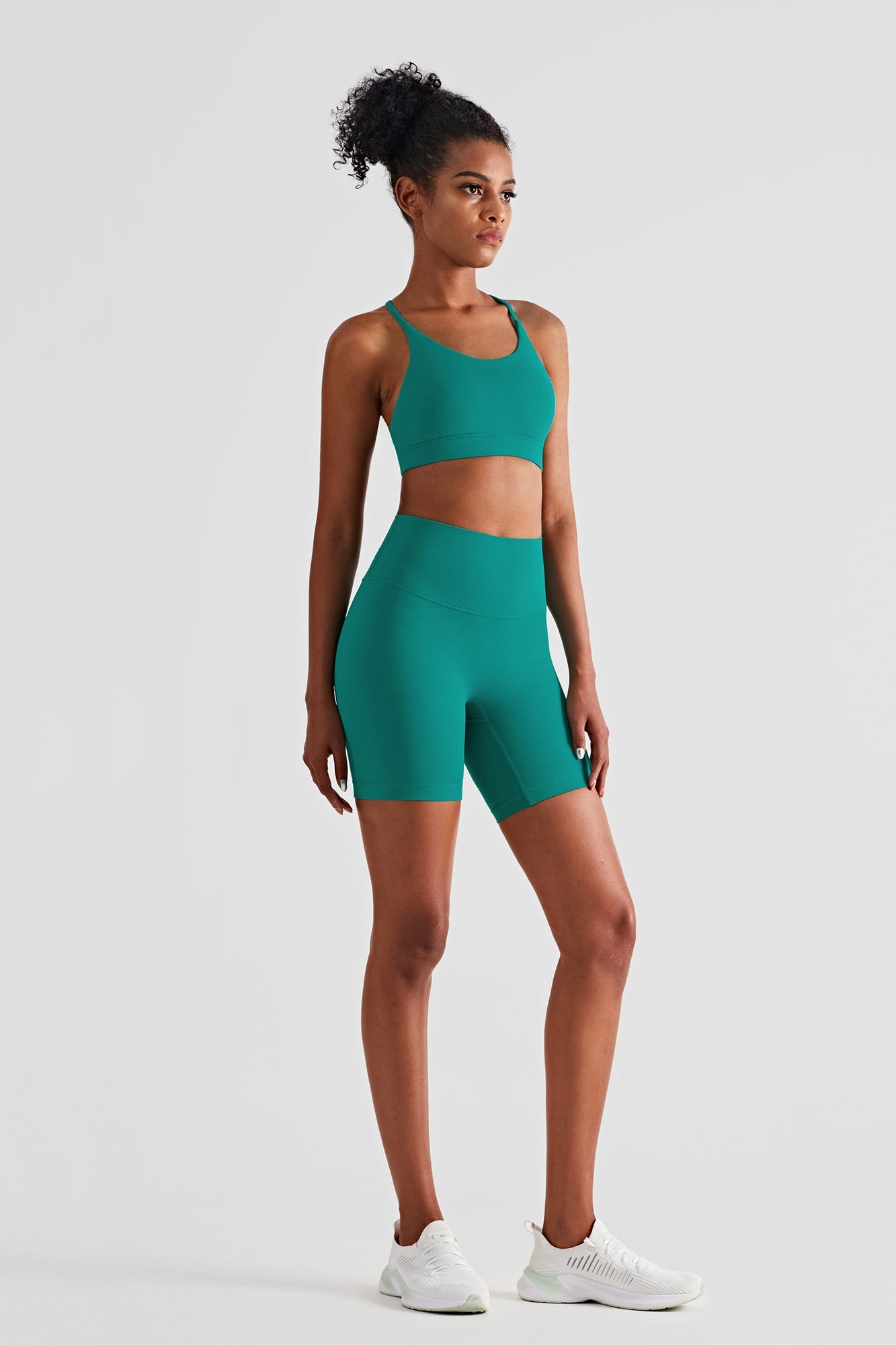 https://zioccie.com/cdn/shop/products/triangle-back-sports-bra-and-biker-shorts-womens-activewear-sets_4.jpg?v=1672056198