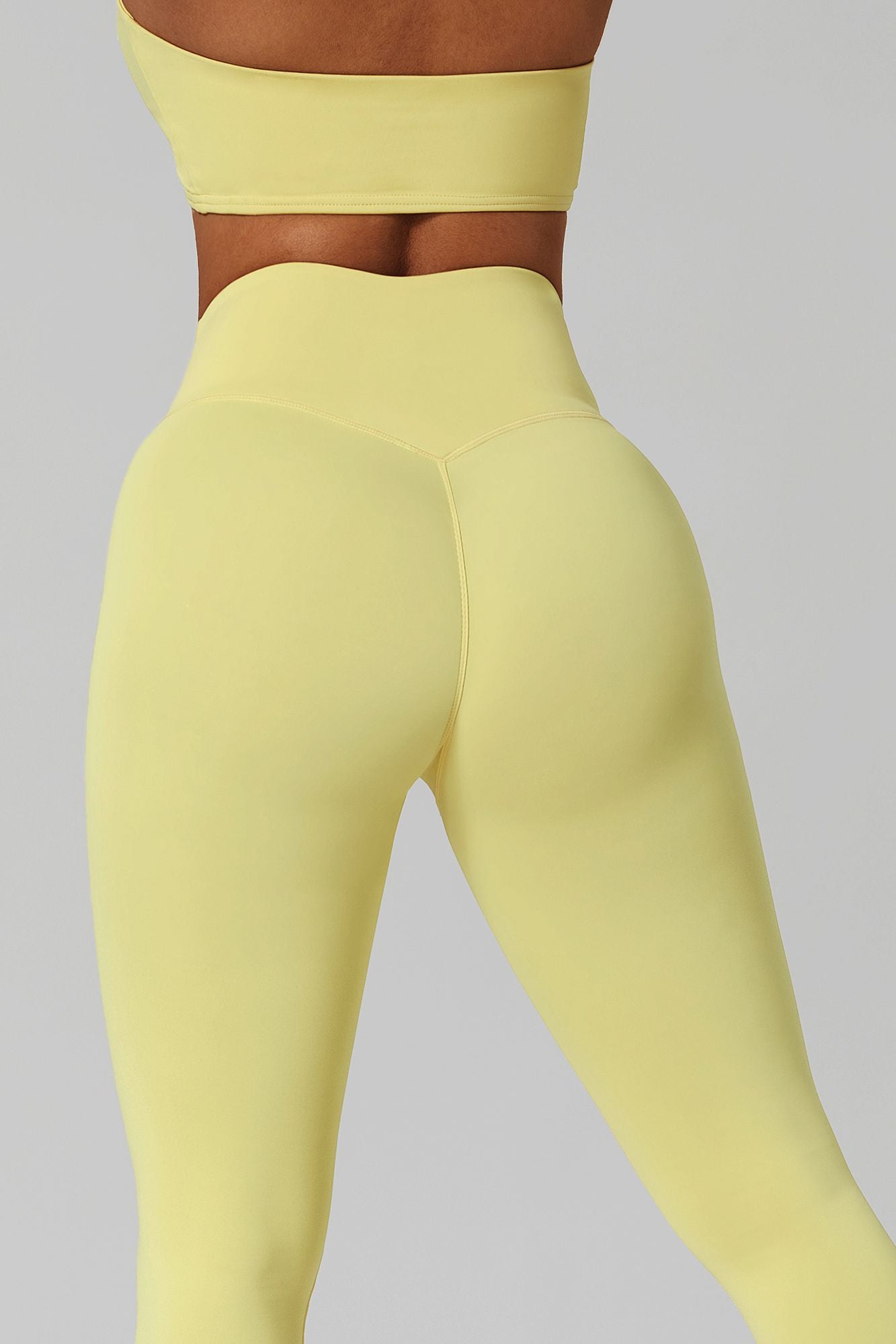 https://zioccie.com/cdn/shop/products/womens-crossover-waistband-butt-sculpting-no-front-seam-leggings_6.jpg?v=1667926499